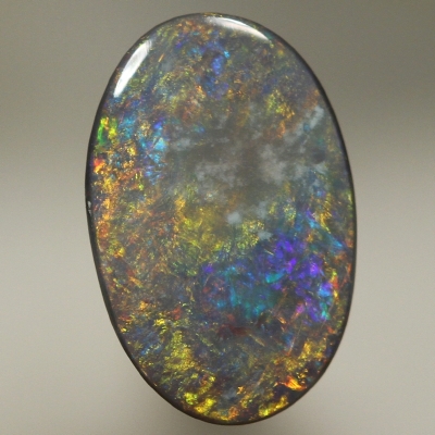 SOLID BLACK OPAL Golden fire over peacock blue